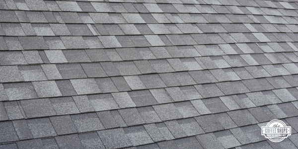 Image of an asphalt roof, The Coffee Shops logo in the bottom right