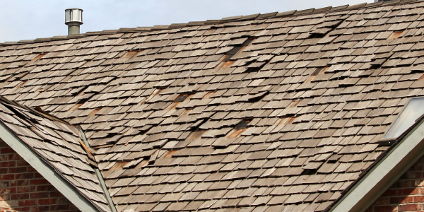Image of a damaged cedar shake roof
